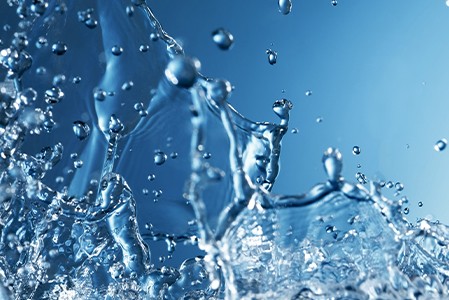 A splash of water on a blue background.