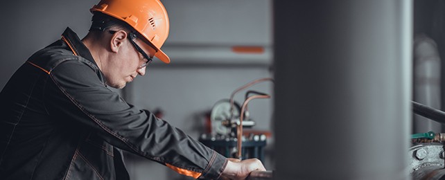 professional in orange hard hat